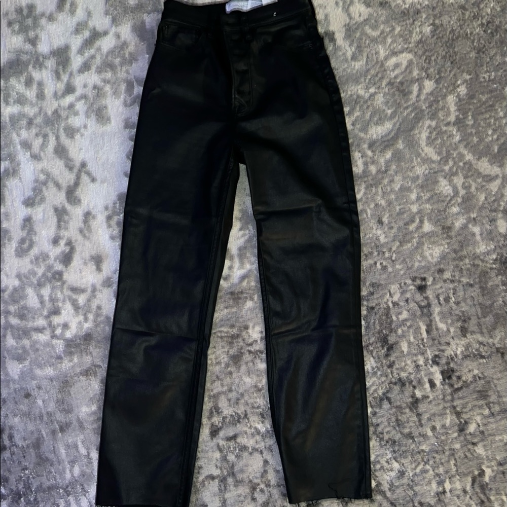 Coated black jeans
